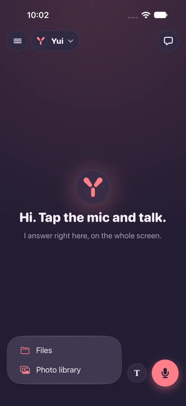 Dark mode: the plus menu open with Files and Photo library, T and the mic beside it.