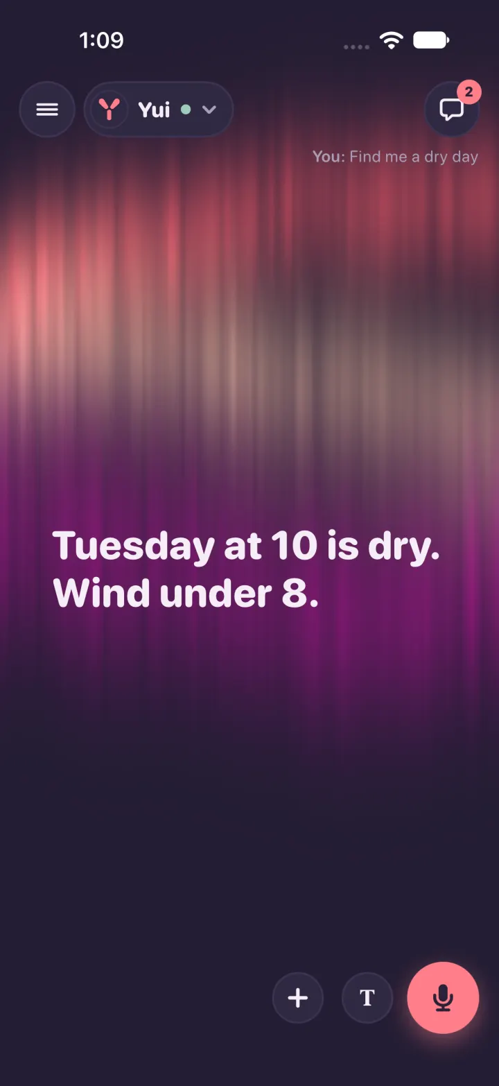 Aurora in dark mode, soft pink light behind the words Tuesday at 10 is dry