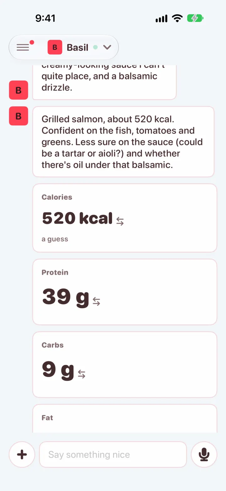Basil reads a photo of grilled salmon: about 520 calories marked a guess, with protein and carbs tiles