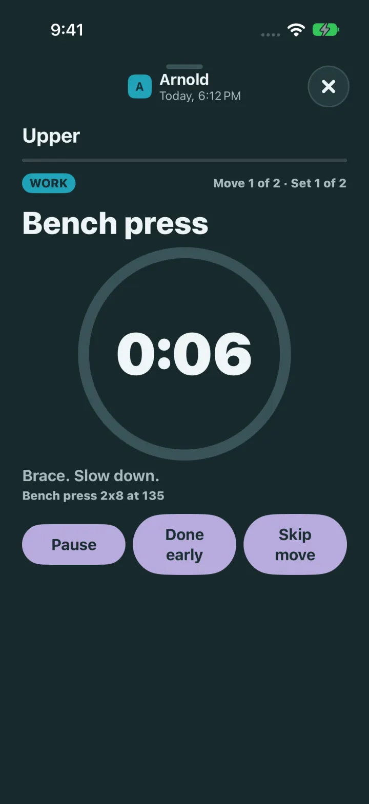 A work set: Bench press, Work, move 1 of 2, a clock ring counting down and the coach line Brace. Slow down.
