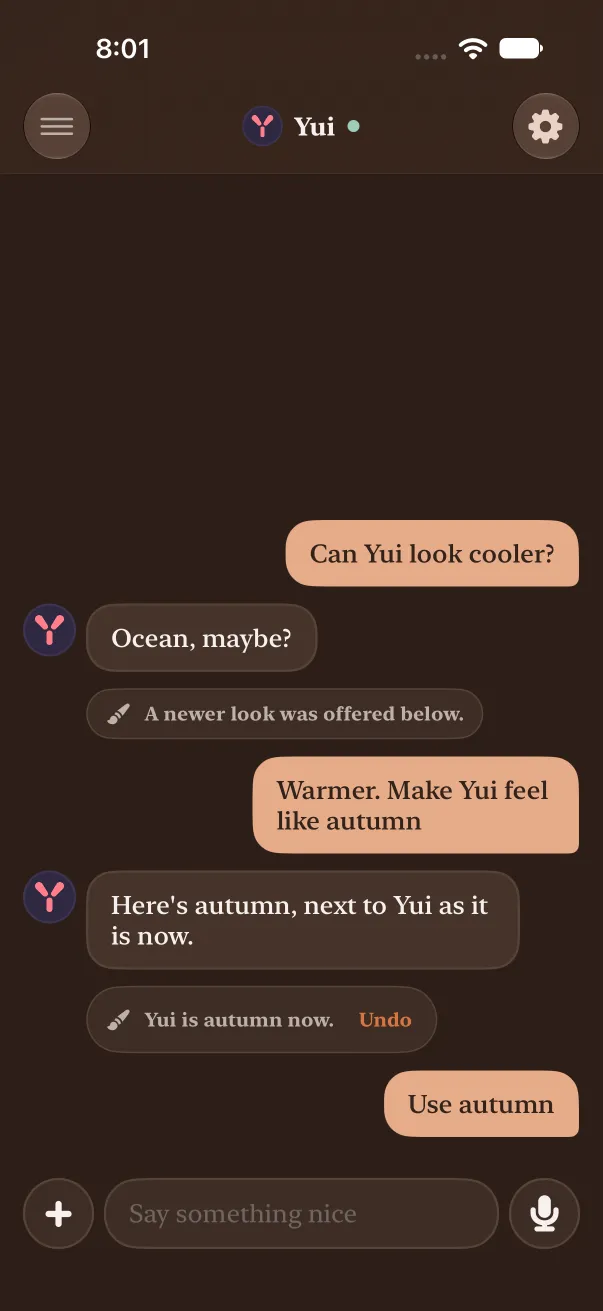 Dark mode after Use autumn: the thread is warm brown with a serif font, and the card is one line, Yui is autumn now, with Undo.