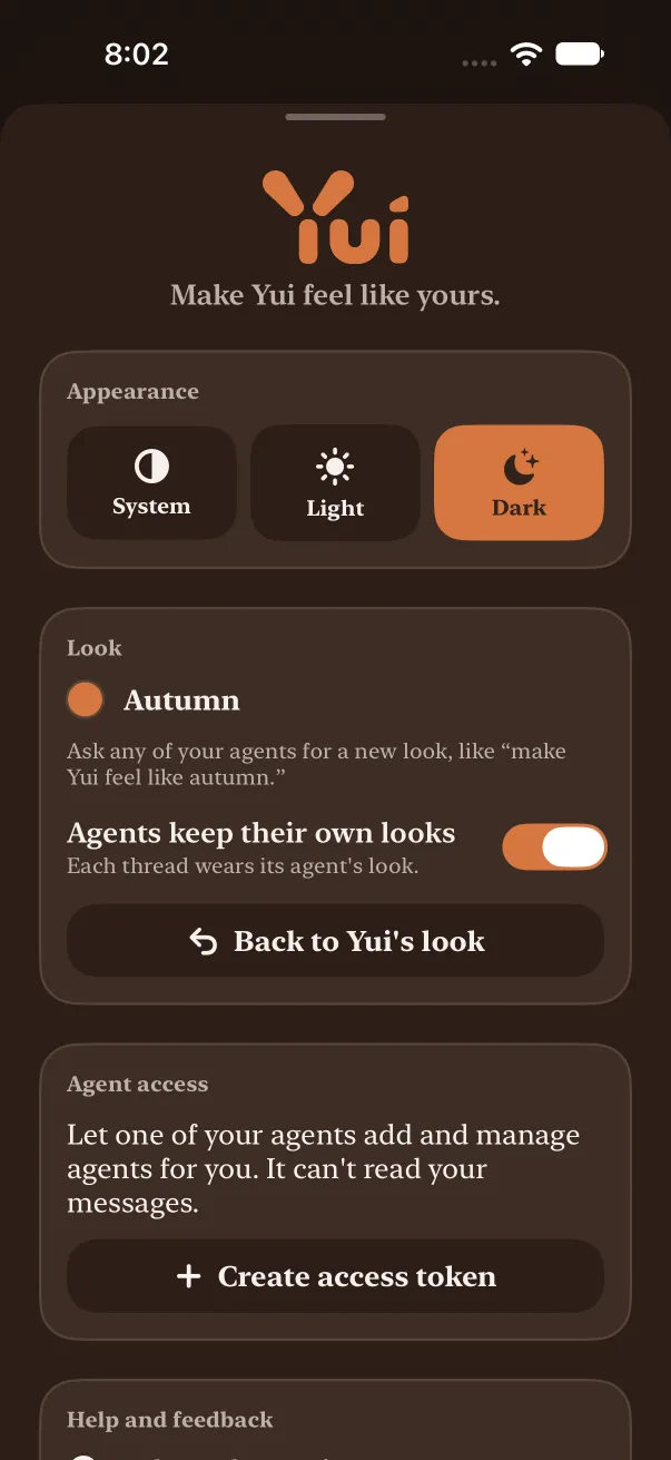 Dark mode, Settings in autumn: the Look section names Autumn, the Agents keep their own looks switch is on, and Back to Yui's look sits under it.